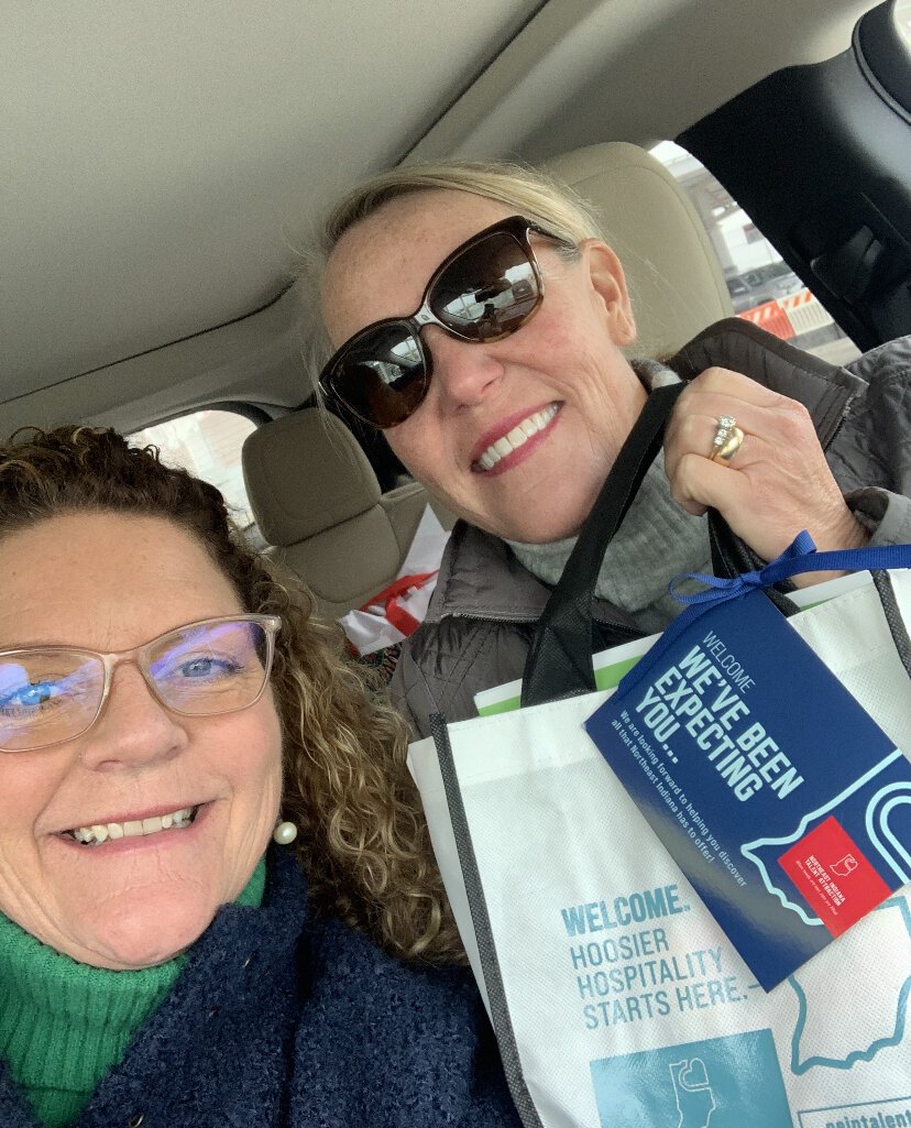 Kathy Ray, Sr. Director of Candidate Experience for NEITA, and Nancy Ecclestone, Director of Business Development, provide gift bags for job candidates.