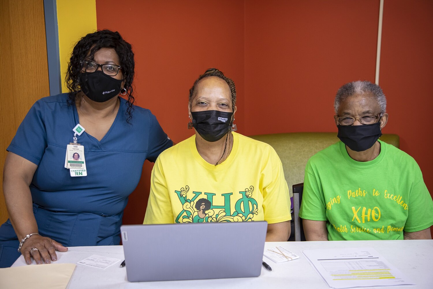 Working the pop-up COVID vaccine clinic at Renaissance Pointe YMCA are, from left, Carmen Moore, manager of Community Nursing, Parkview Health, and Phyllis Bragg and Stella Goodman, nurses from the Zeta Eta chapter of Chi Eta Phi nursing sorority.
