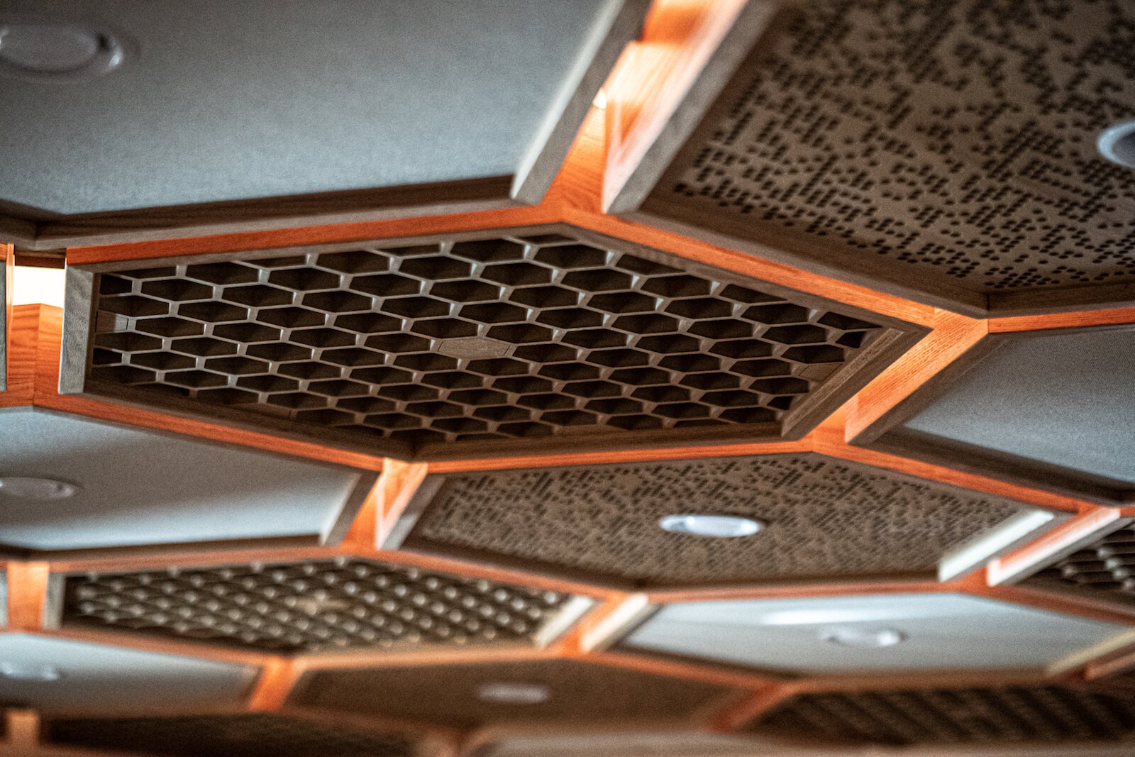 Honeycomb ceiling tiles add to the acoustic environment.