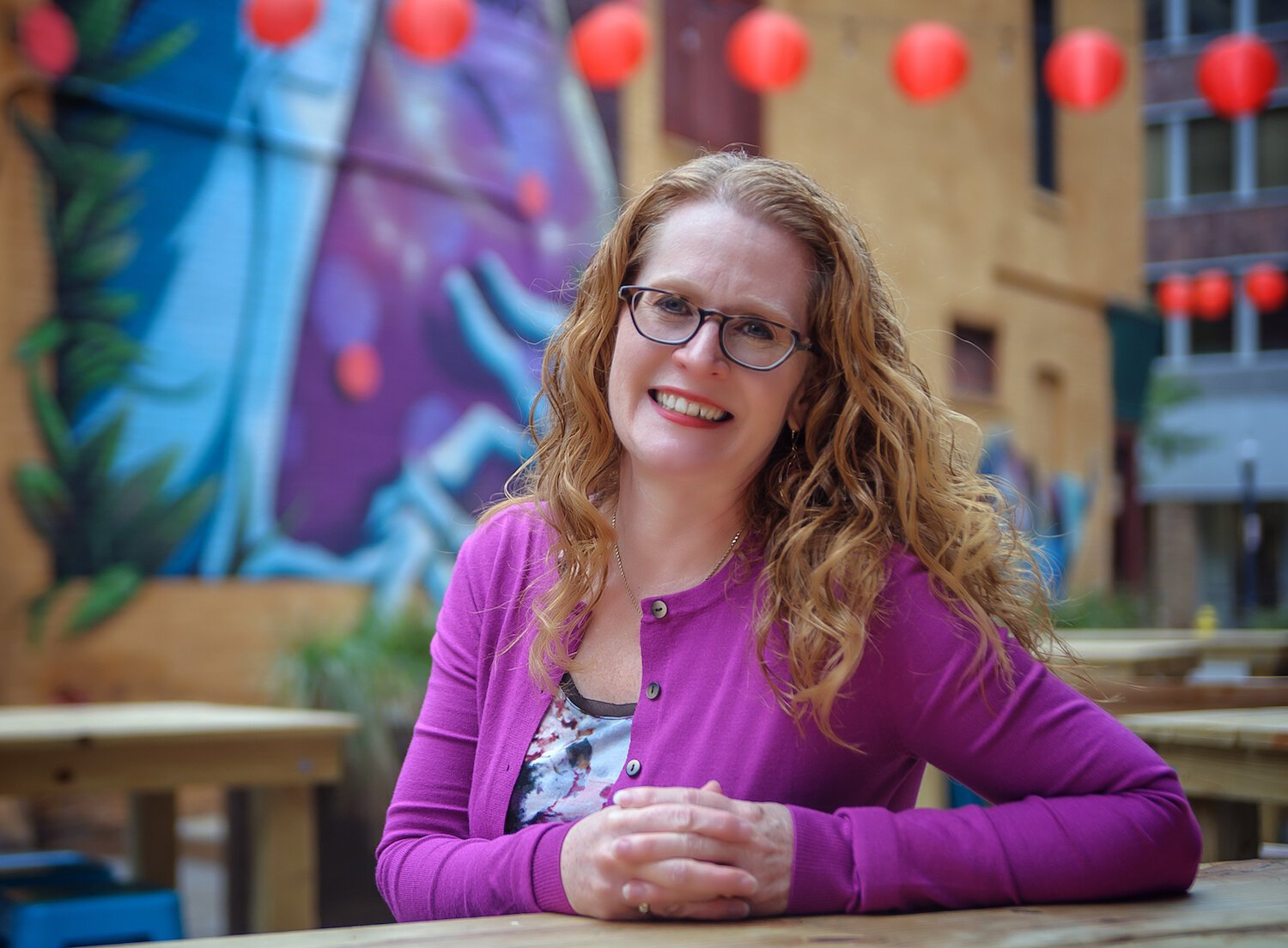 Sherise Fortriede, Senior Planner with the City of Fort Wayne, sits in the award-winning Porch off Calhoun.