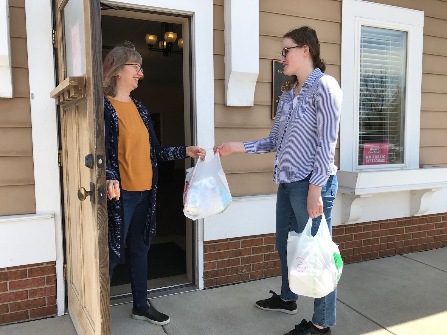 Delivering groceries to those unable to leave the house is one way to help during the pandemic.