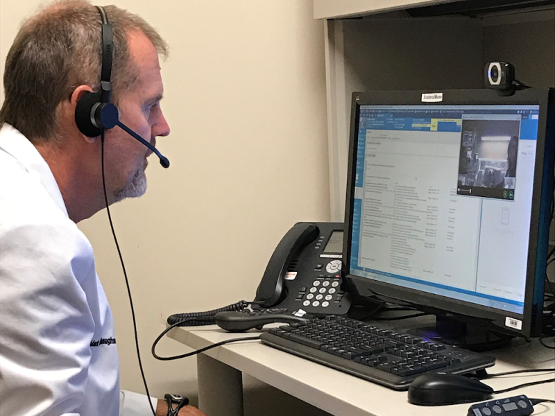 Dr. Mark O’Shaughnessy, Cardiologist, demonstrates the equipment used in virtual consultations with patients in community hospitals.
