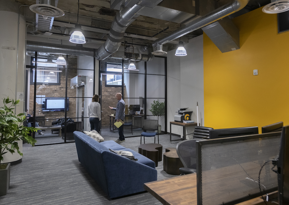 Aptera's office has a combination of private offices and collaborative space.