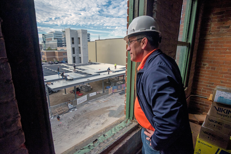Kirk Moriarty, Director of Business Development for Greater Fort Wayne Inc., overlooks development on The Landing.