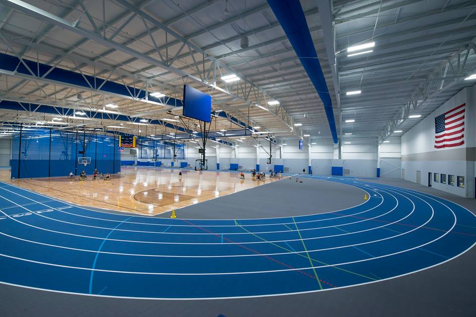 The Plassman Athletic Center is a 75,000-square-foot fieldhouse with a 230-meter track and four collegiate sized basketball courts.