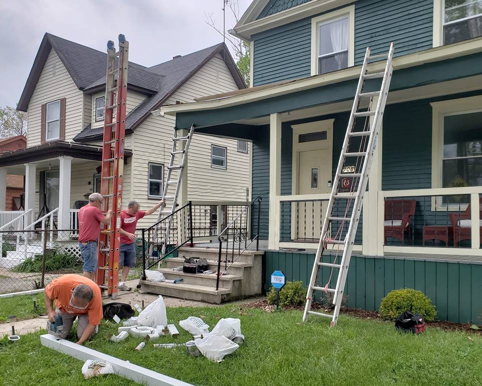 Volunteers help Vincent Village maintain its houses.