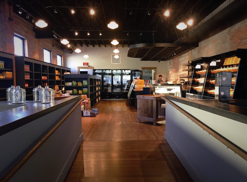 A glimpse at the market's layout inside while setup is in progress.