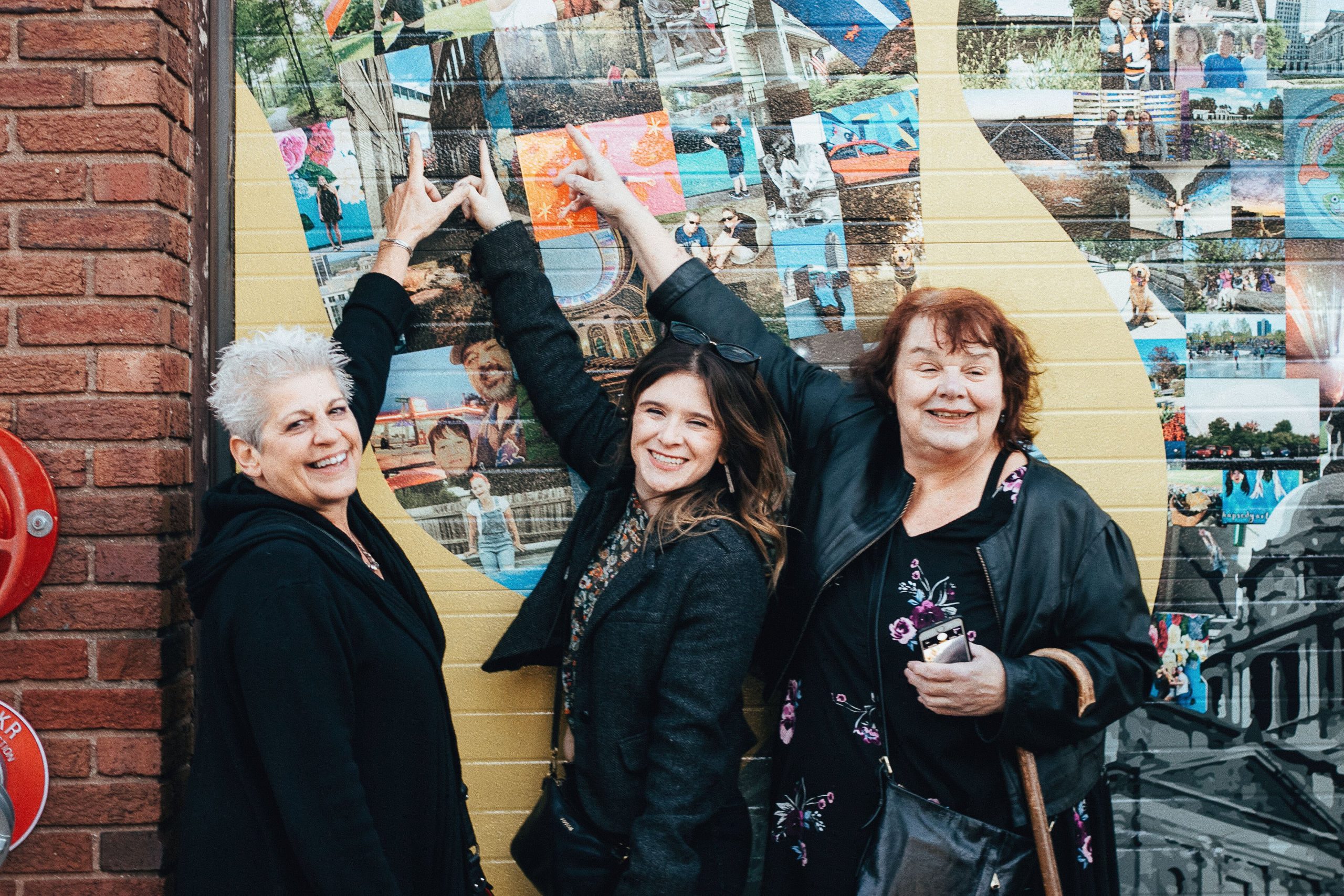 Smiling faces at the Oct. 12 mural reveal at Hop River Brewing Company