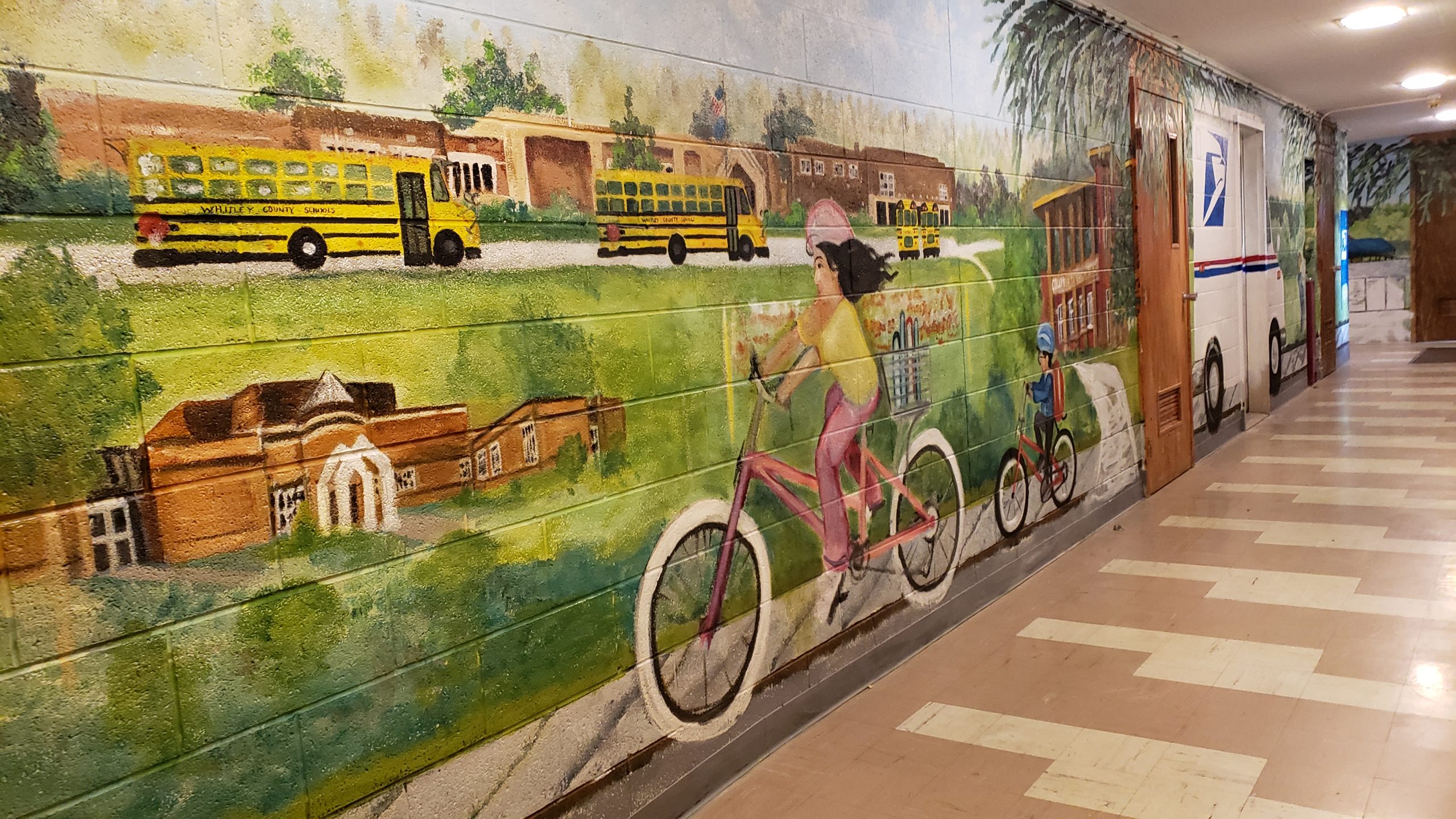 The mural at Community of Hope depicts scenes from life in Whitley County.