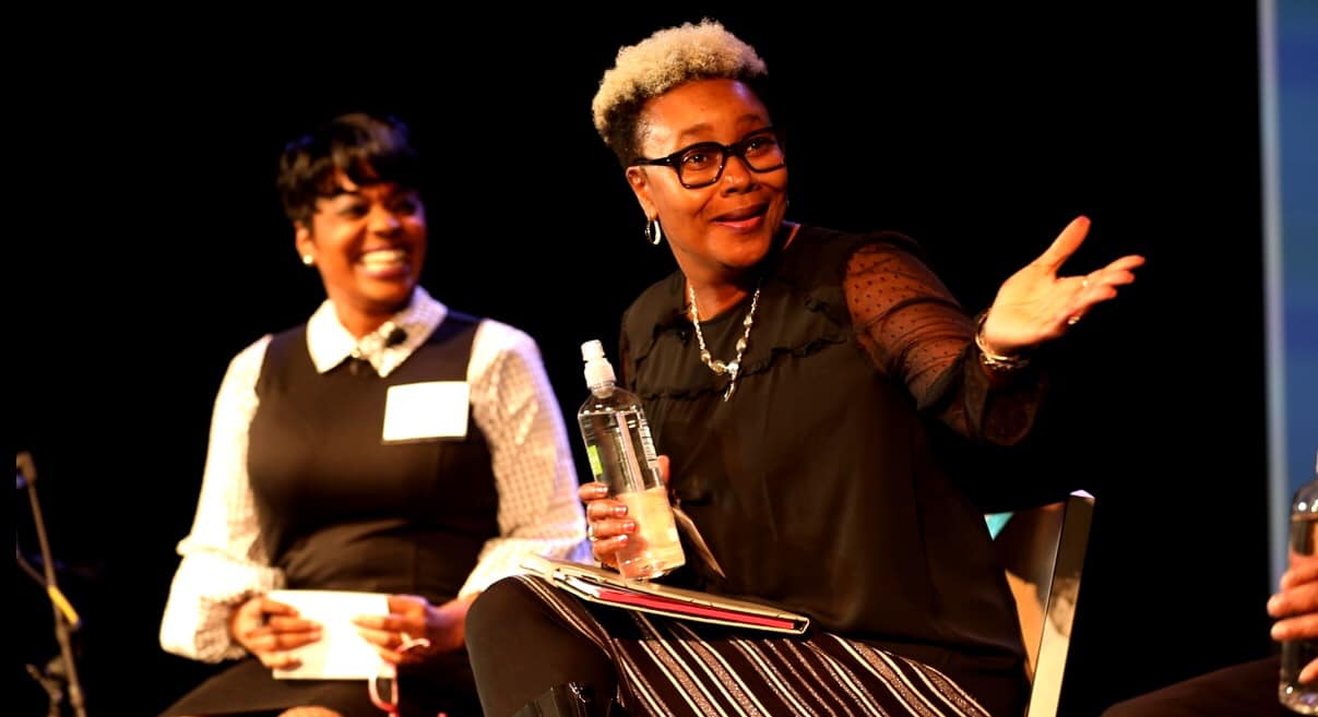 Sherry Early-Aden speaks at an event.