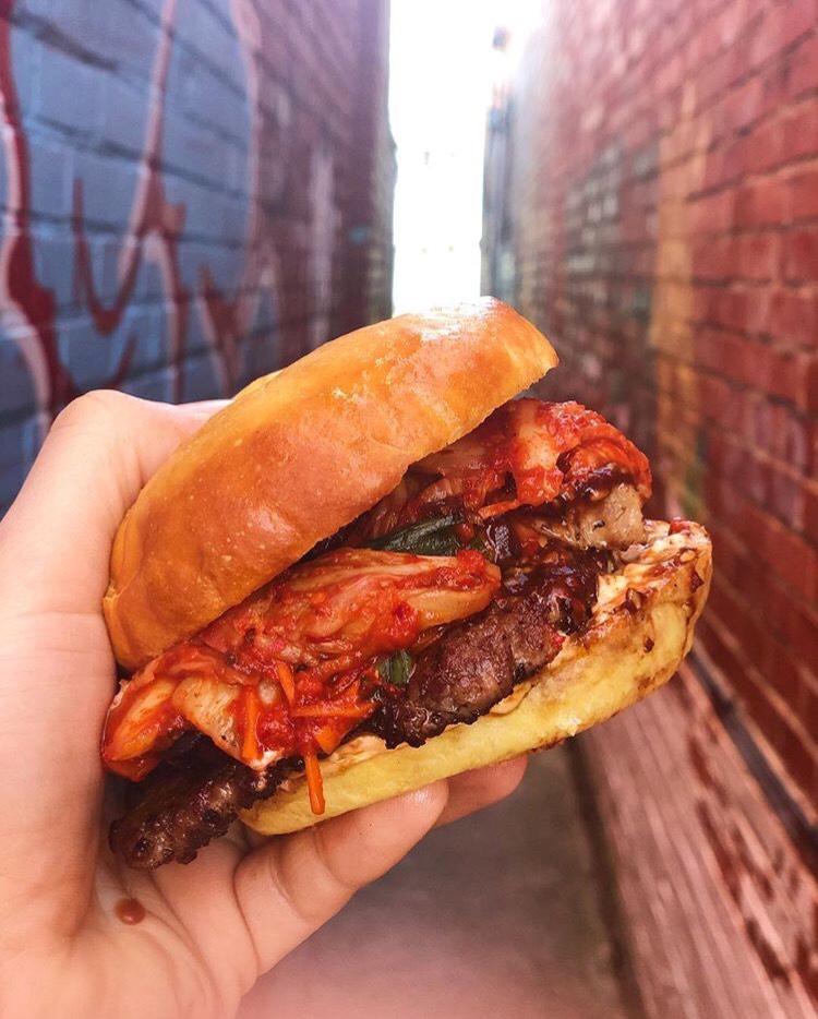 Bravas customers can enjoy a burger with kimchi.