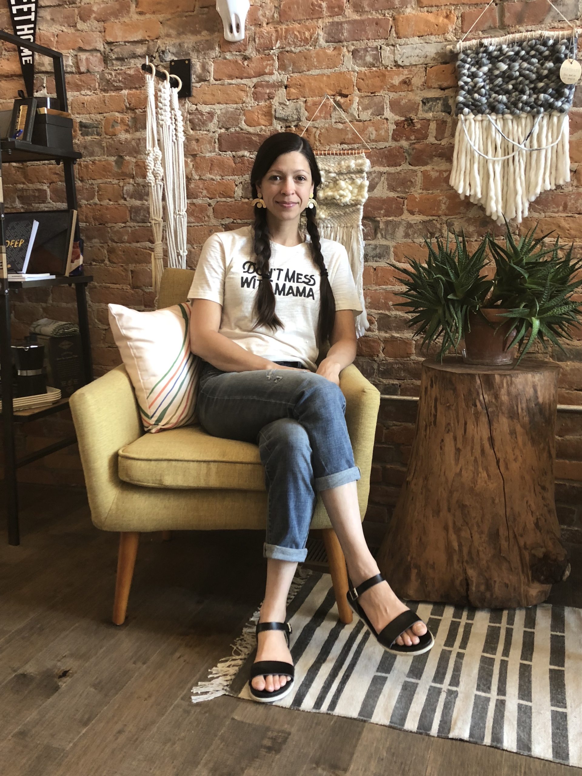 Tabor Olinger, owner of Fancy & Staple on Broadway, is excited about the area's present and future.