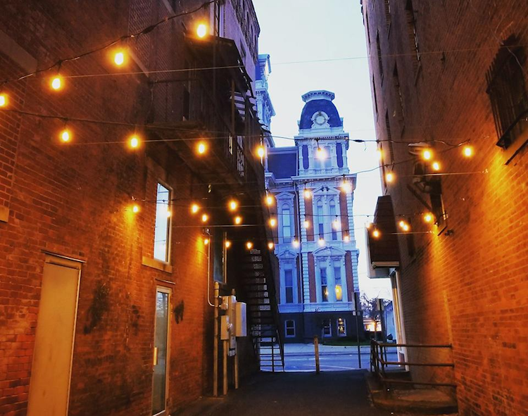 Small adjustments like lights make a big difference in converting this Van Wert, Ohio, alley into a "third place."