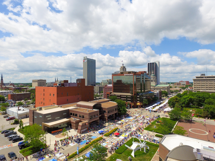Artists color the streets of Fort Wayne during the Chalk Walk at the Three Rivers Festival.