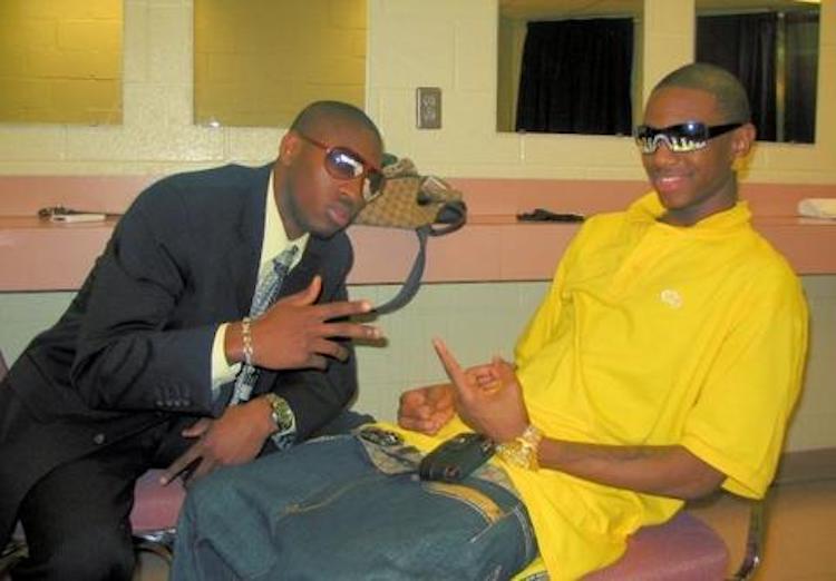 Robinson, left, poses with his customer Soulja Boy.