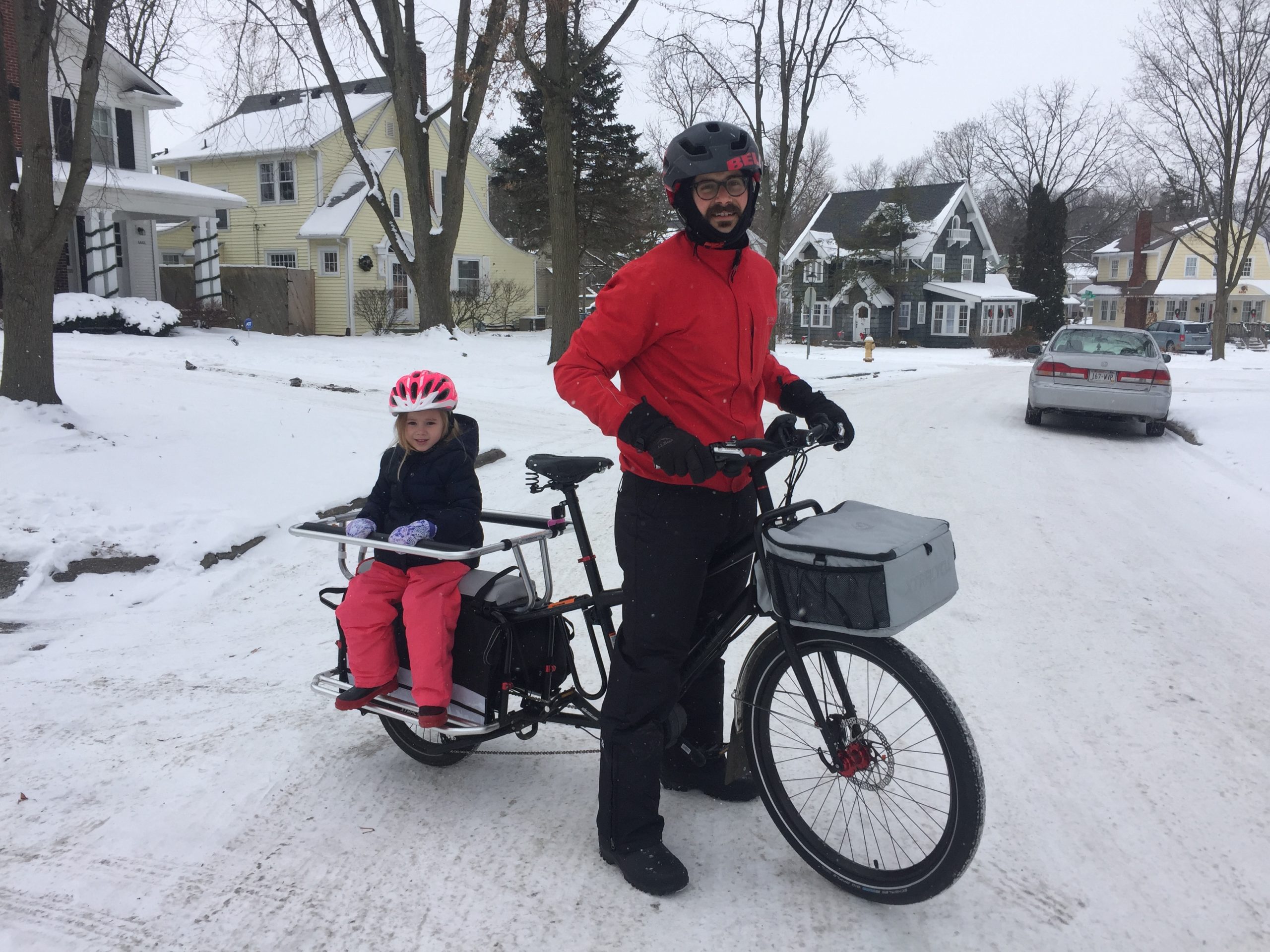Serrani takes his daughter Francesca, 5, for a ride in the family's cargo bike.