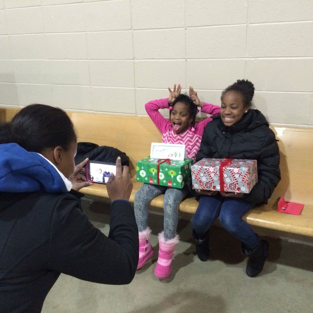 Children enjoy last year's Holiday Giveback at Bridge of Grace Compassionate Ministries Center.