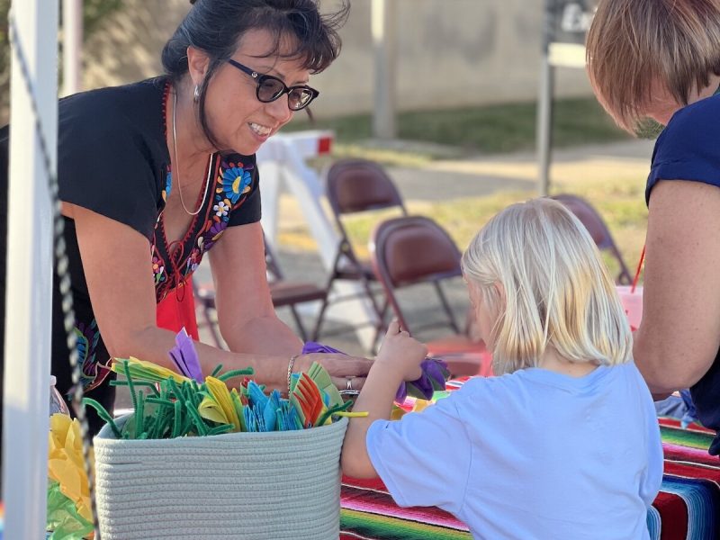 Attendees explore a booth at the Hispanic Heritage Festival in North Manchester.