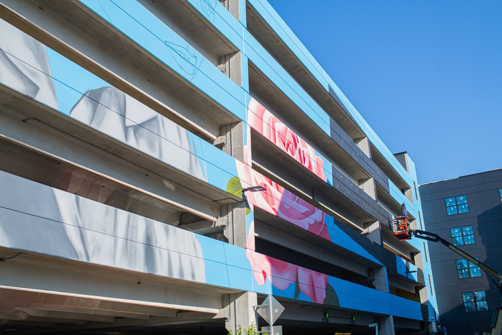 Progress on the mural on the Union Parking Garage at Electric Works on September 12, 2025.