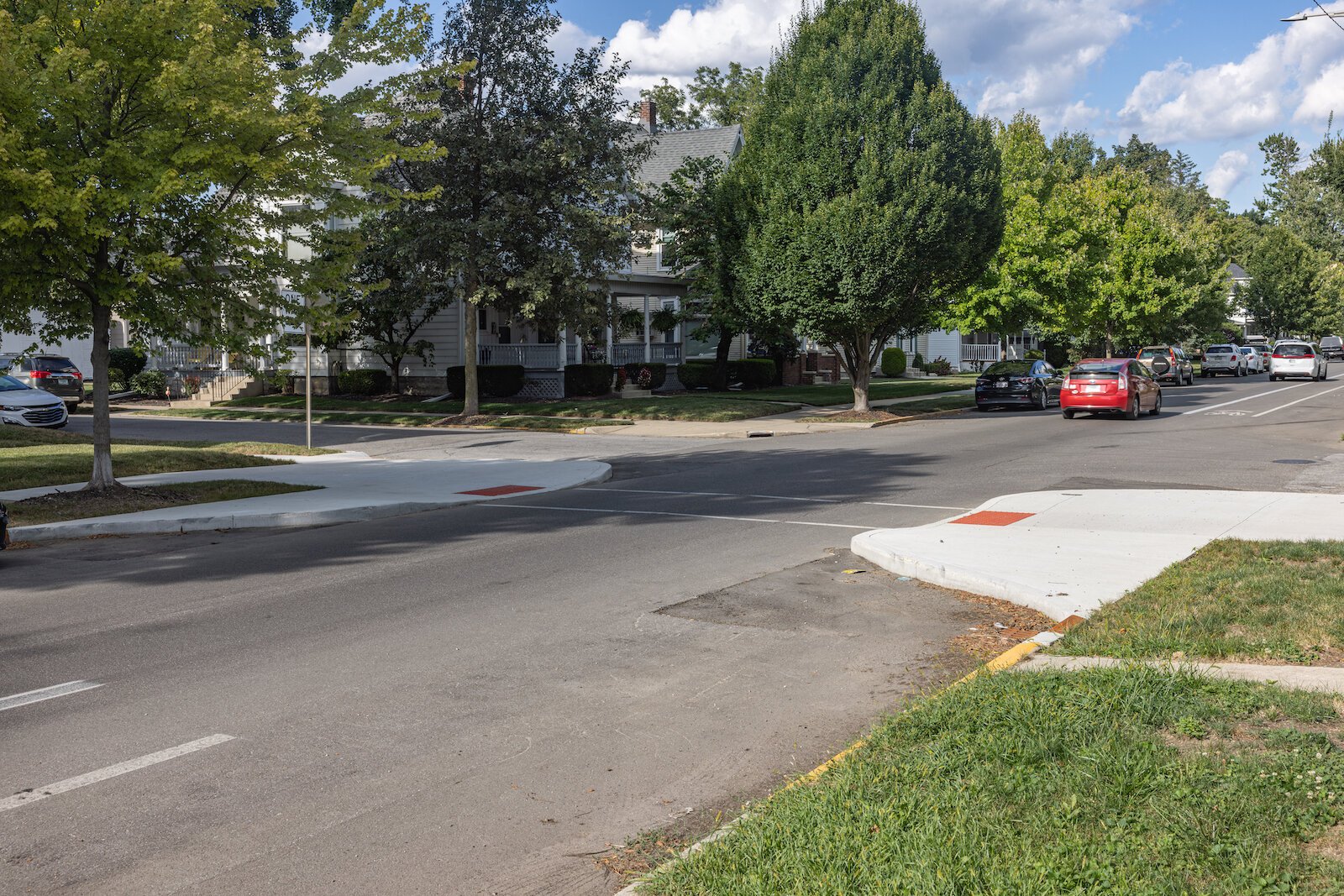 A growing number of curb extensions — or “bump outs” in Fort Wayne, like this one on Columbia Avenue, are designed to improve pedestrian visibility and vehicular speed reduction. This one was installed as part of the Historic Northeast 2035 Plan.